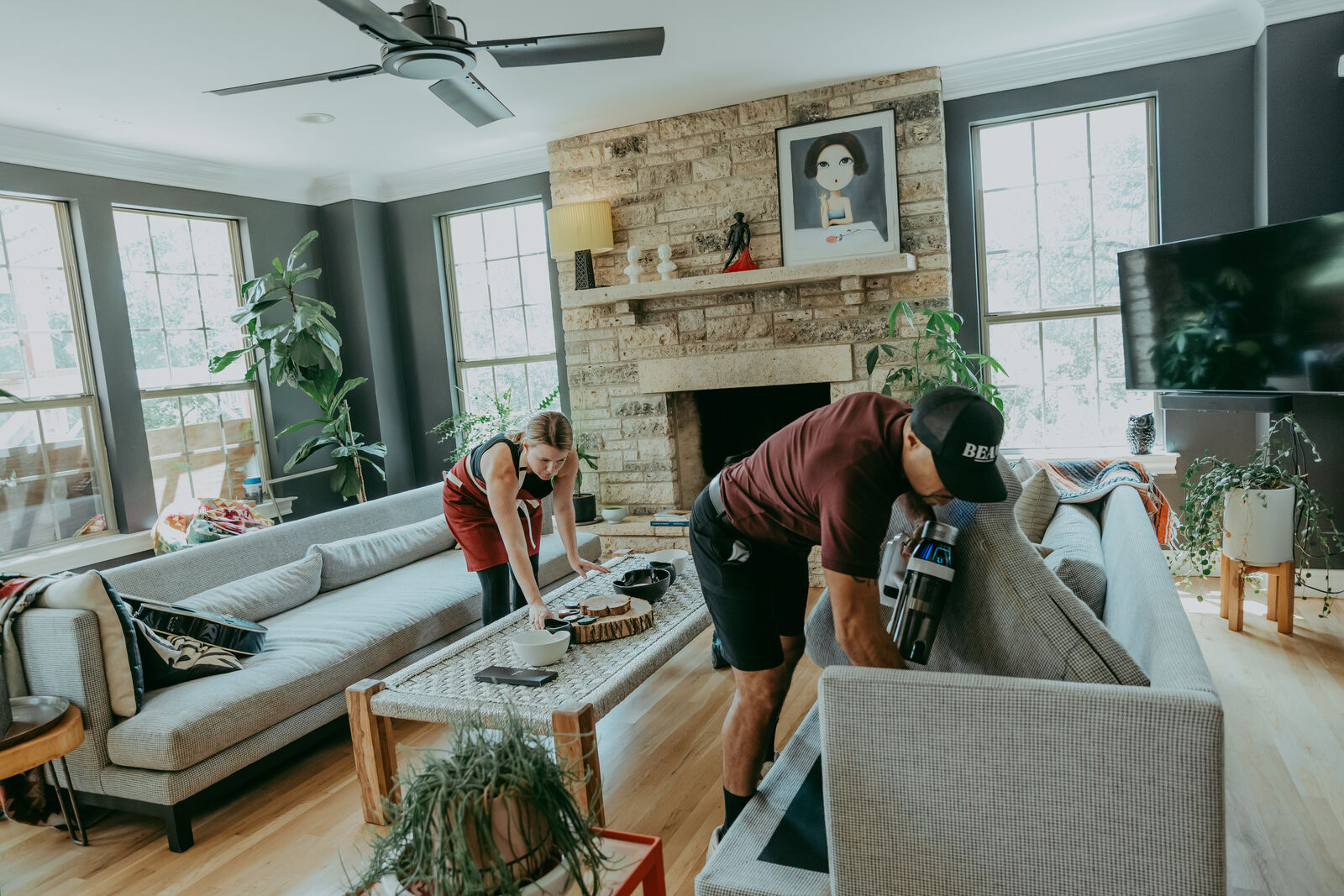 The Beam team cleaning a bright Austin living room